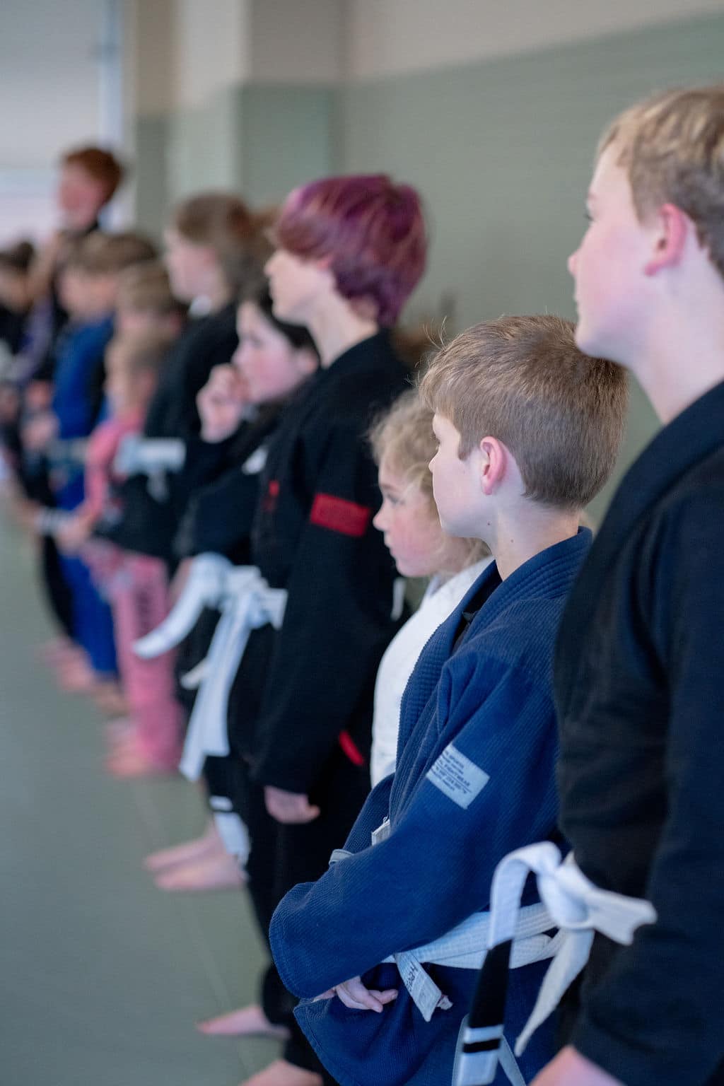 Line up of The Jiu Jitsu Institute young students
