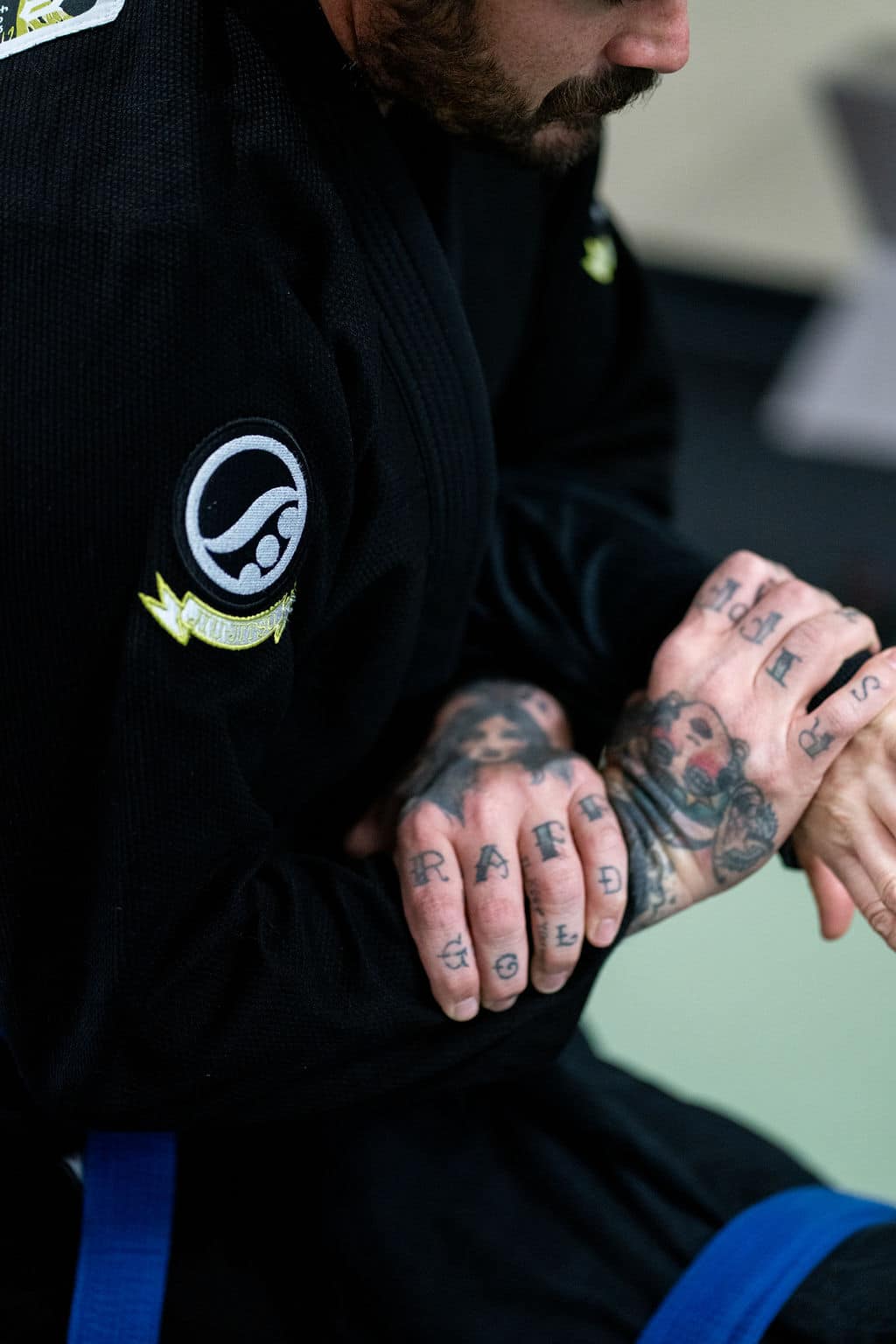 Close up of jiu jitsu students demonstrating proper hold techniques
